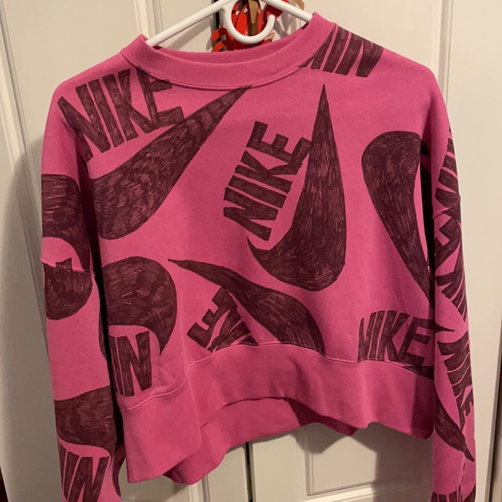 Pink Nike sweatshirt